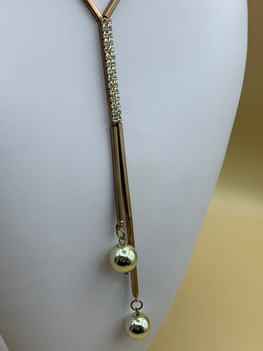 Necklace with stylized pendant