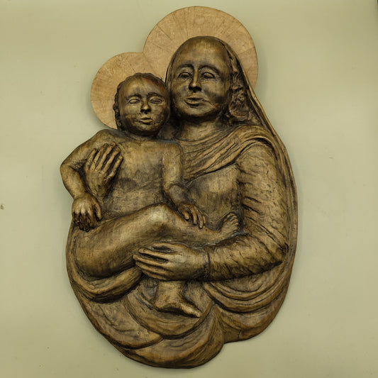 Handmade wooden sculpture of Madonna with child from the 1950s