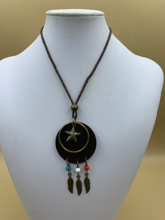 Necklace with star and feather pendant