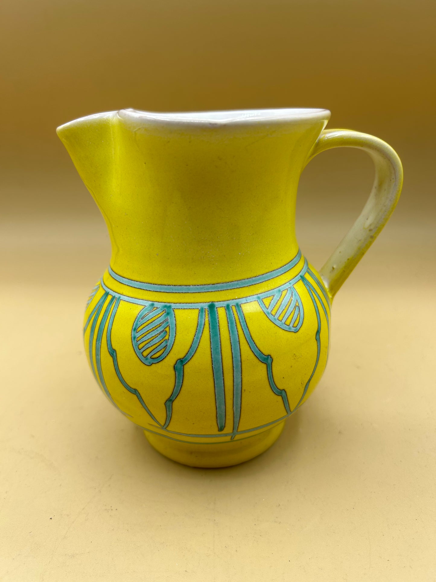 Hand-painted yellow ceramic jug