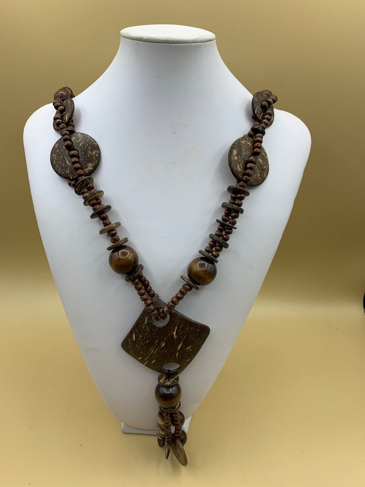 Necklace with rope and coconut pendant