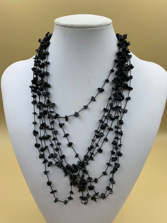Multi-strand black bead necklace