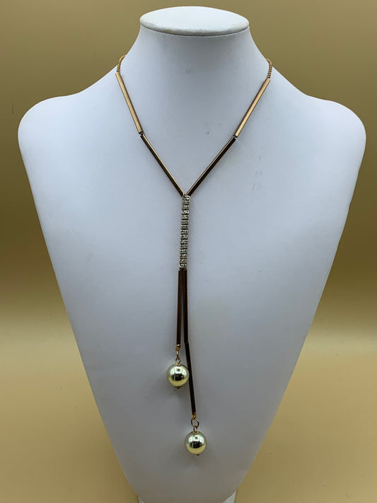 Necklace with stylized pendant