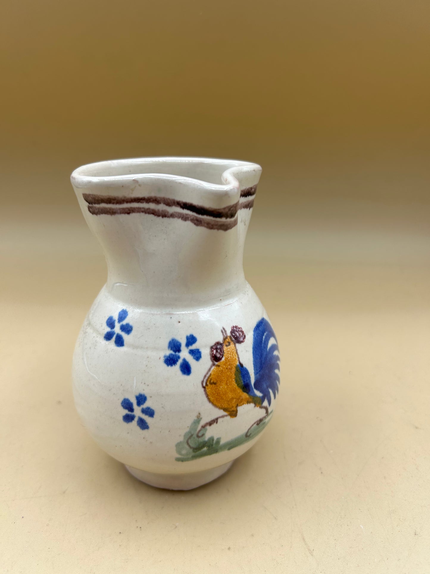 Hand-painted ceramic jug with rooster