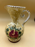 Hand-painted ceramic jug with flowers