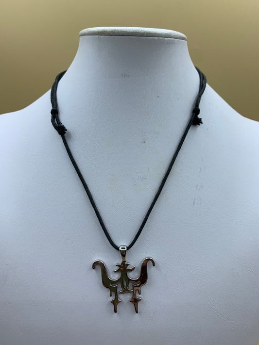 Necklace with metal pendant